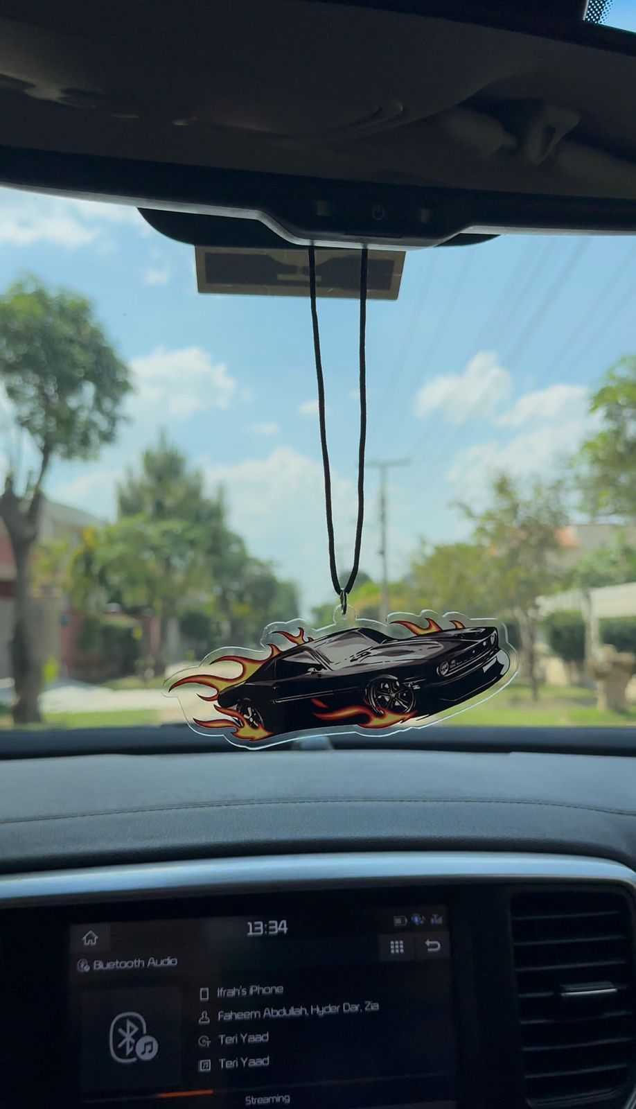 Flaming dodge challenger car hanging