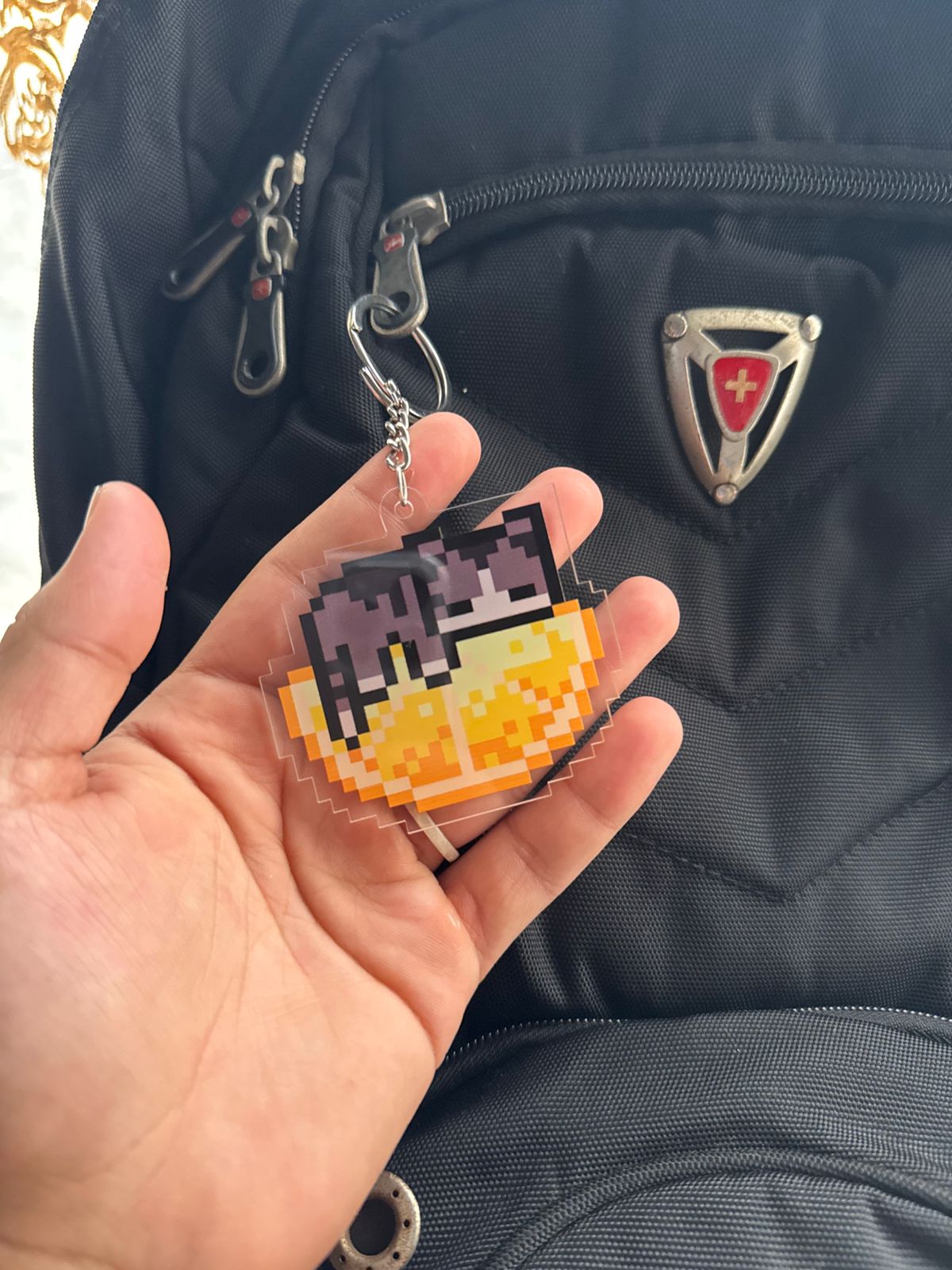 Cat on orange keychain
