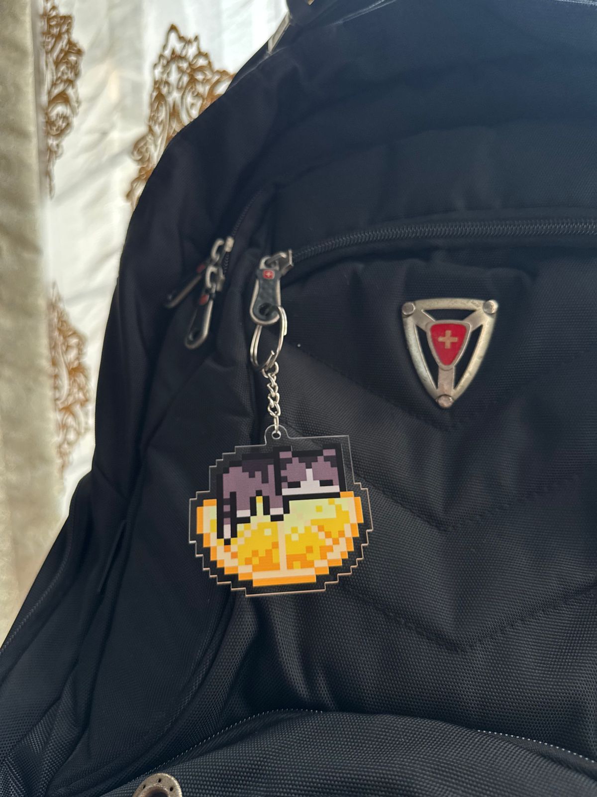 Cat on orange keychain