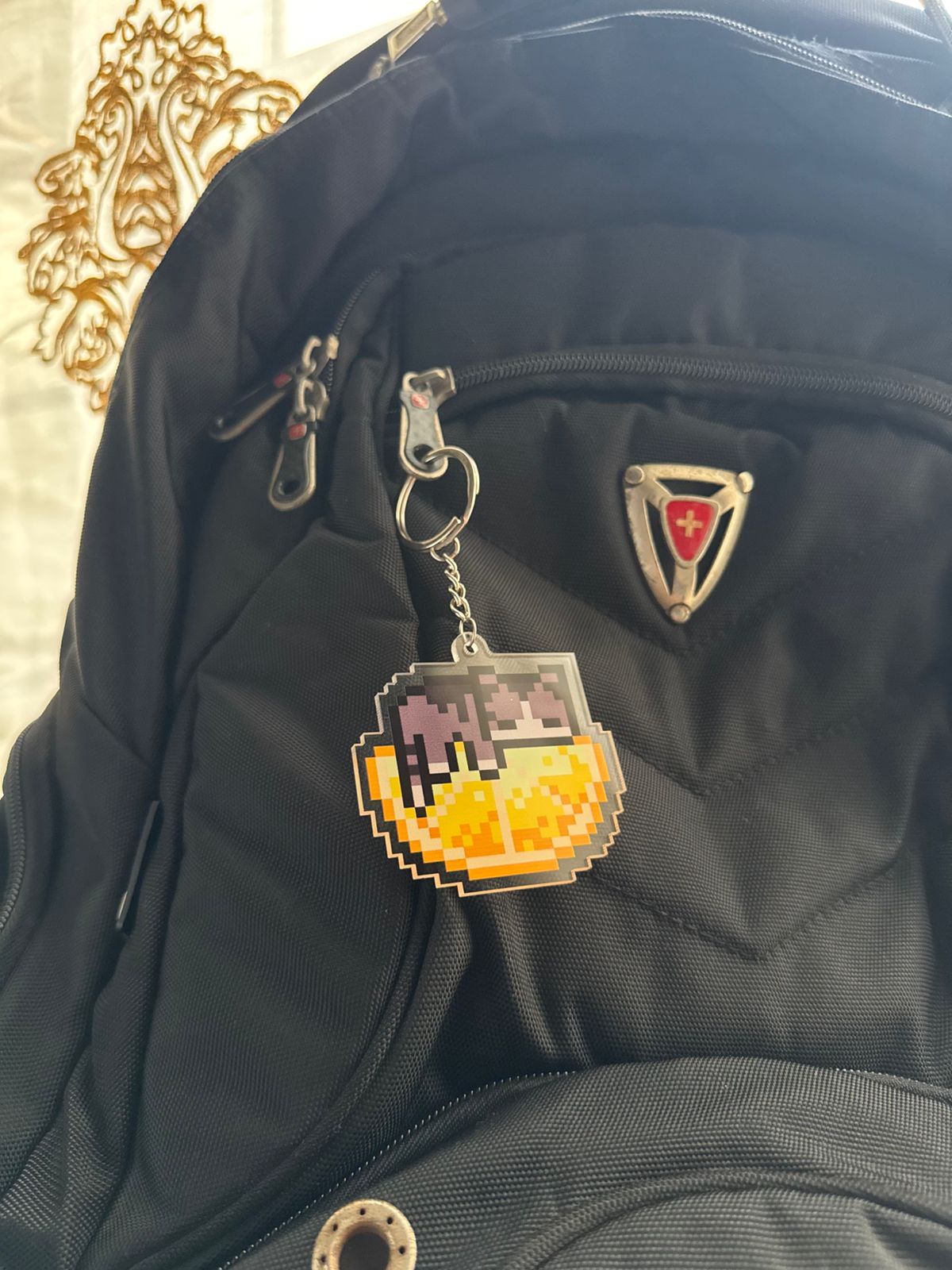 Cat on orange keychain