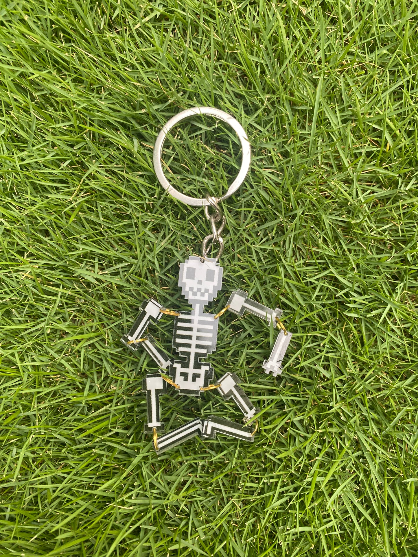 Movable skeleton keychain