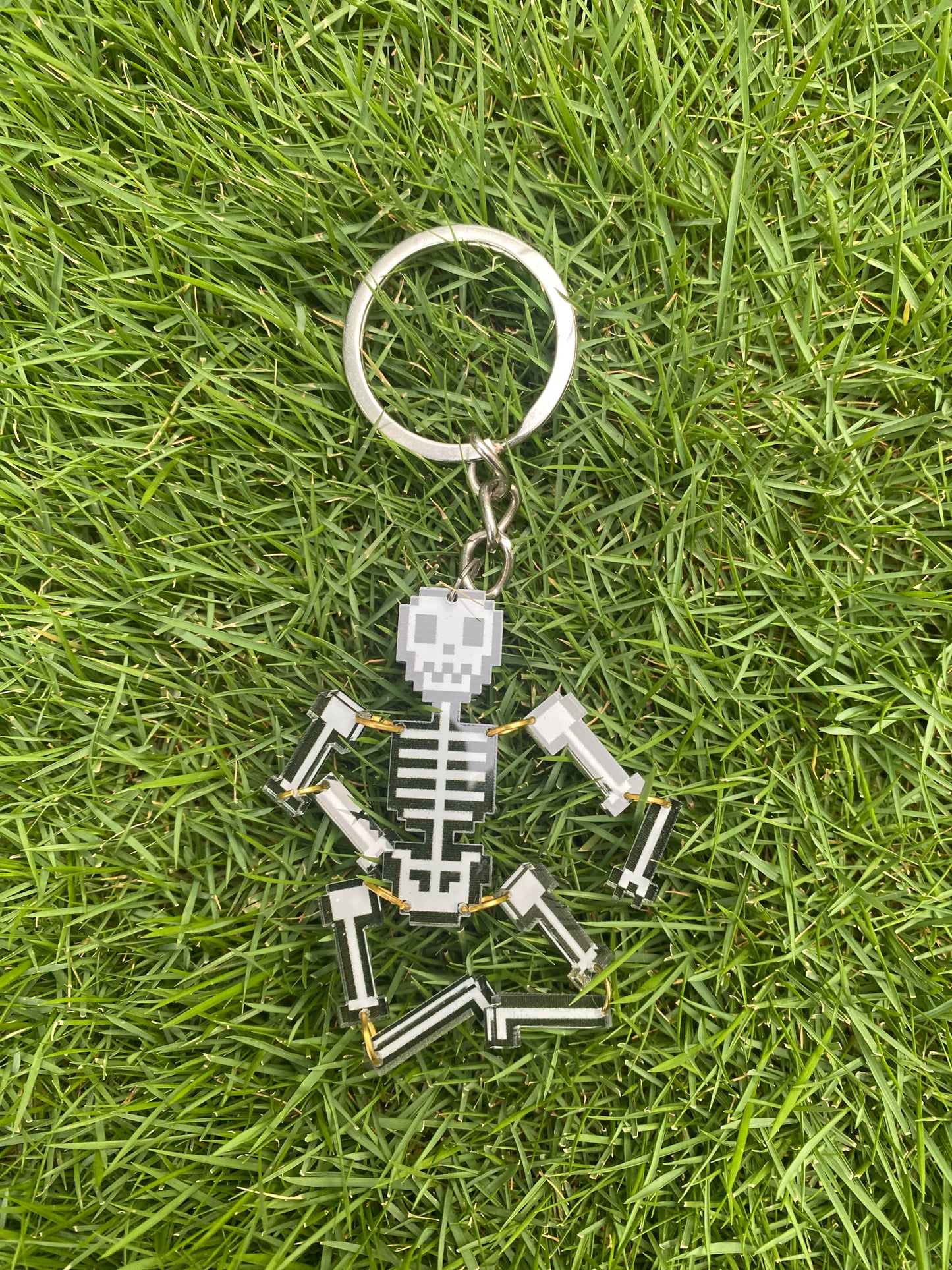 Movable skeleton keychain