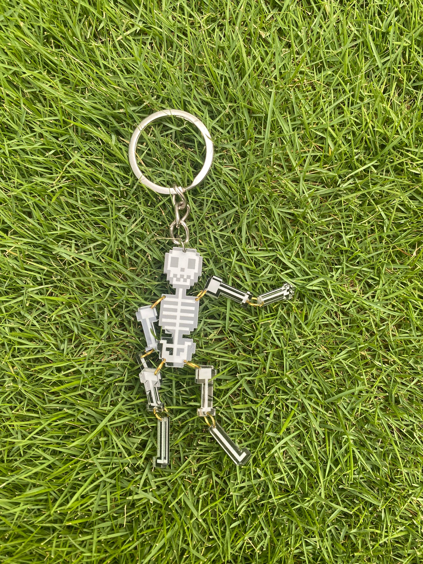 Movable skeleton keychain